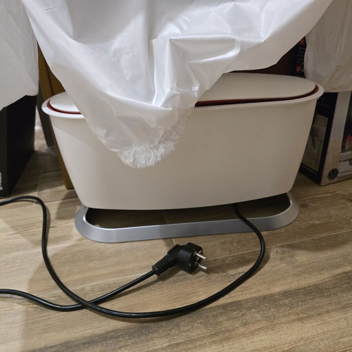 Automatic ironing machine for shirts and trousers