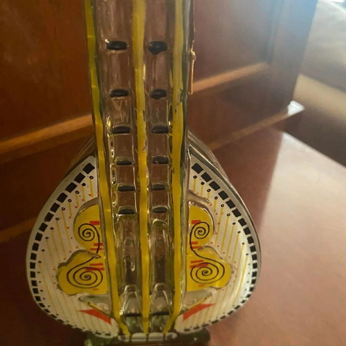 Bouzouki-shaped liquor bottle used with painted details