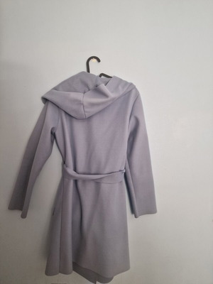 Coat used, muted light blue