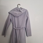 Coat used, muted light blue