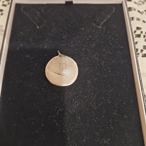 Aigner silver pendant like new