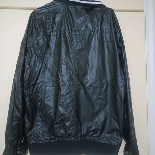 Black vinyl jacket used with white stripes, size L Pull & Bear