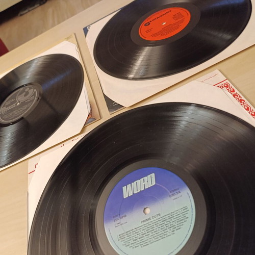 Collection of 3 vinyl records like new