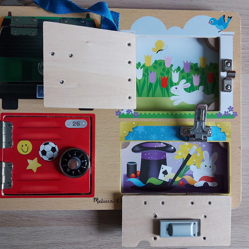 Melissa & Doug wooden board with locks used