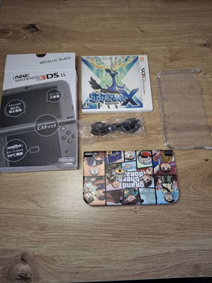 Nintendo New 3DS XL Metallic Black като нов с игра Pokemon X