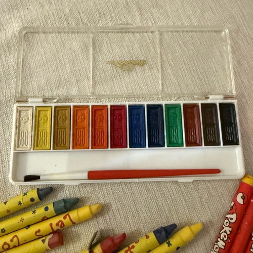 Watercolors and crayons slightly used
