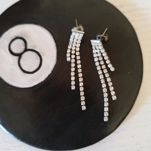 Silver dangling earrings like new with rhinestones