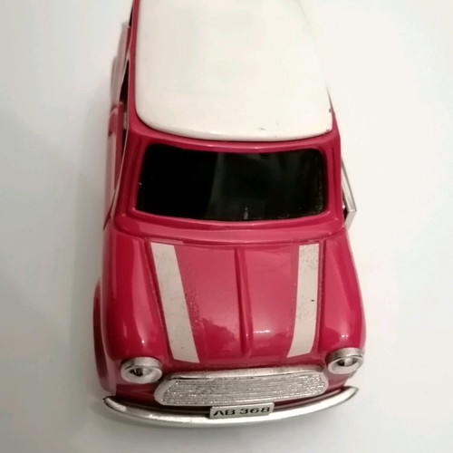 Mini Cooper miniature with clock used, red with white roof