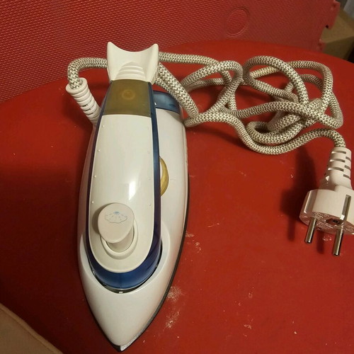 Travel iron new