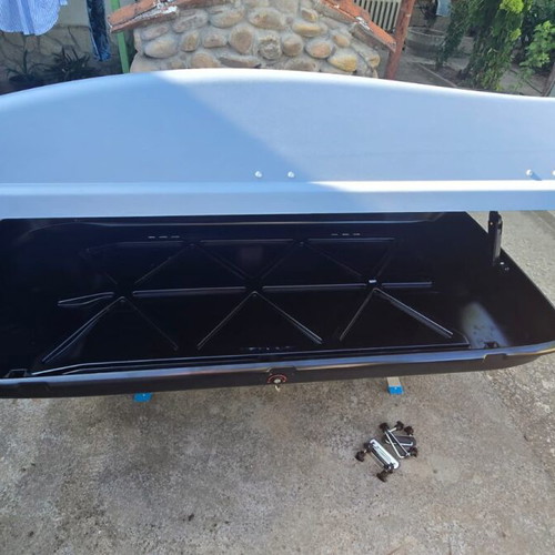 Car roof box with triple lock and two keys