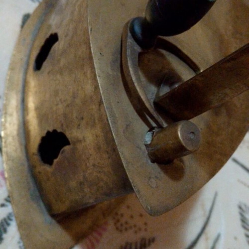 Vintage brass coal iron in golden tone, like new