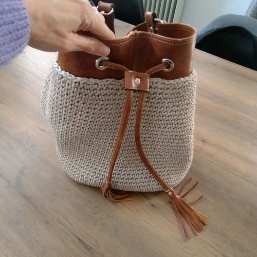 Handmade bucket bag used with brown leather details