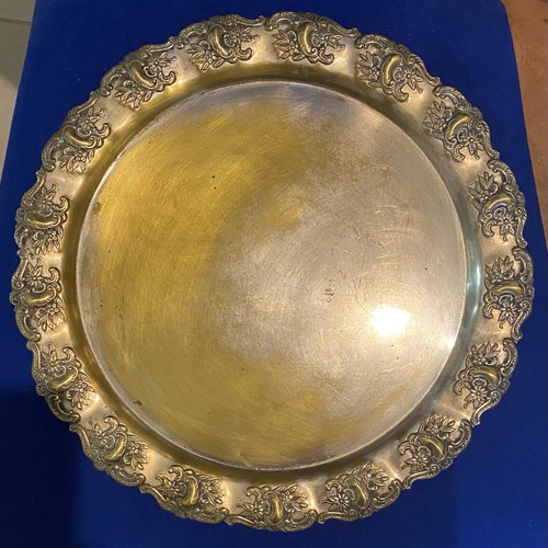 Vintage metal tray used with embossed floral patterns
