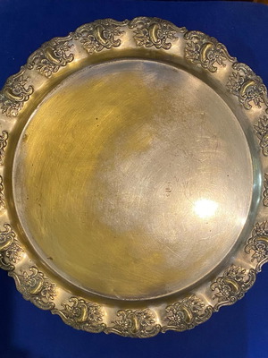 Vintage metal tray used with embossed floral patterns