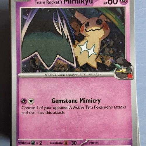 Team Rocket's Mimikyu Pokemon card 097/217