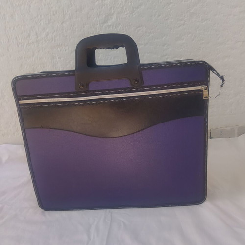 Art bag used, black and purple, with non-working zipper