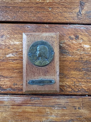 Medallion of Saint Joan of Arc used on wooden base