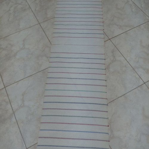 Traditional cotton fabric on loom new, white with colorful stripes
