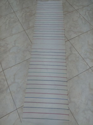 Traditional cotton fabric on loom new, white with colorful stripes