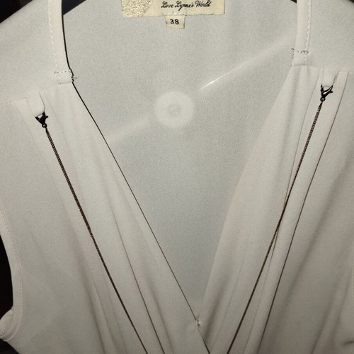 Lynne blouse like new, nude draped design with detachable chain