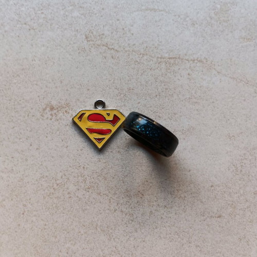 Ring and Superman pendant like new, no chain