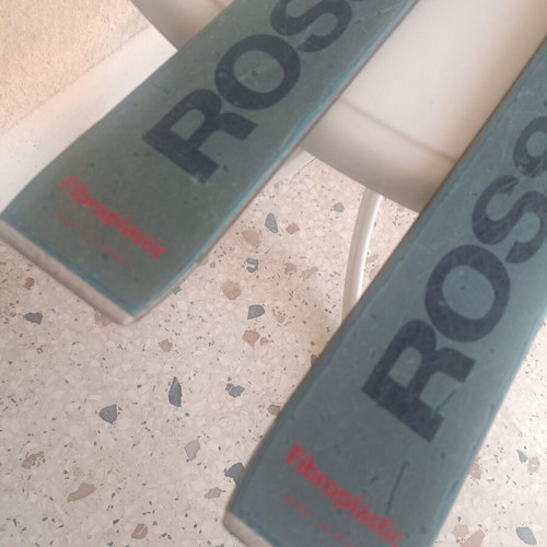 Rossignol STS Fibroplastic skis used with Tyrolia 260 bindings, Skitique poles, and Solomon SX81 325 boots