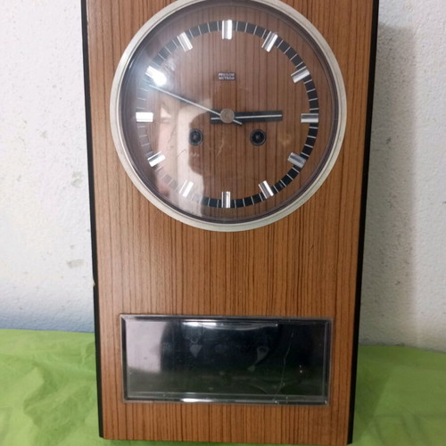 Wooden wall clock used, dimensions 45x25 cm