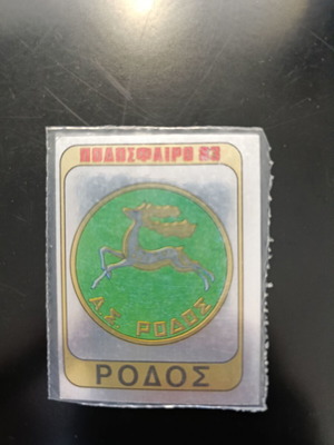 Panini football 83 sticker, Rhodes emblem