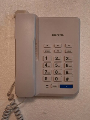 Landline phone with large buttons like new, white, wired