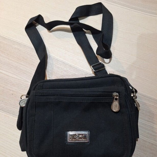 Black crossbody bag with strap