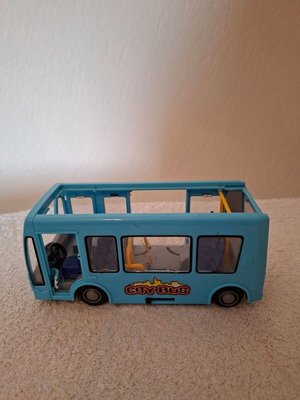 Toy bus used with rolling wheels
