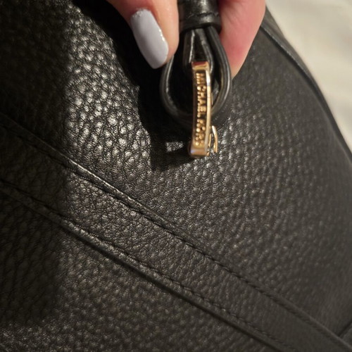 Michael Kors black backpack like new with gold details