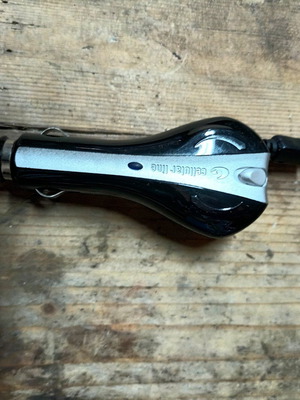 Car phone charger with retractable cable mechanism like new