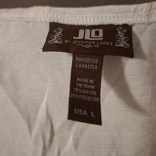 Jennifer Lopez JLO black and white top, size M-L