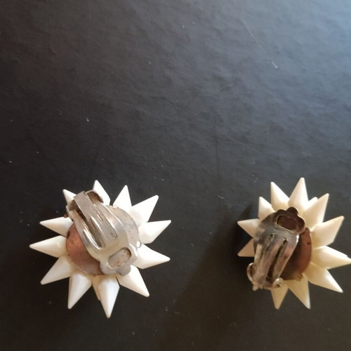 Vintage white clip-on earrings used from the 1960s