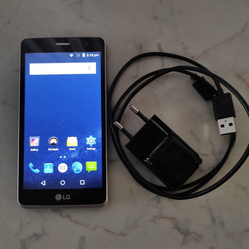 LG Bello II used, functional with charger, no scratches
