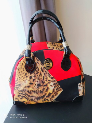 Handbag used, branded with long strap, red and animal print