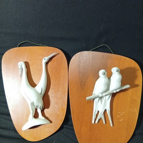 Wall panels used with wooden base and porcelain swallows and storks
