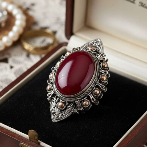 Handmade vintage silver brooch with carnelian stone used