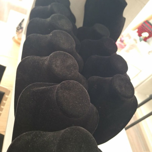 Velvet jewelry display set with 15 small and 1 large necklace stands