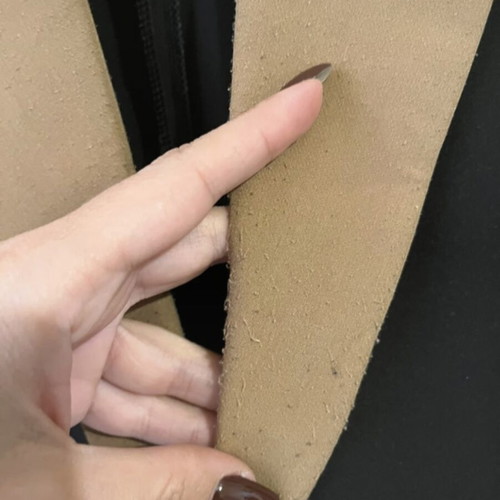 Sleeveless jacket used, black and tan, size small