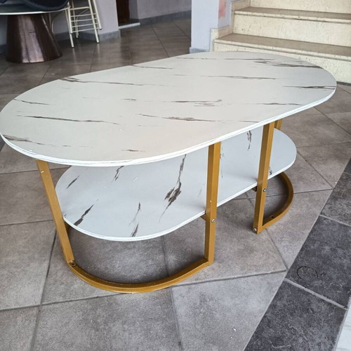 Oval coffee table with marble effect