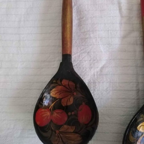 Set of three handmade wooden Russian spoons used, hand-painted
