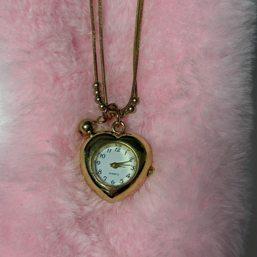 Gold heart necklace with watch