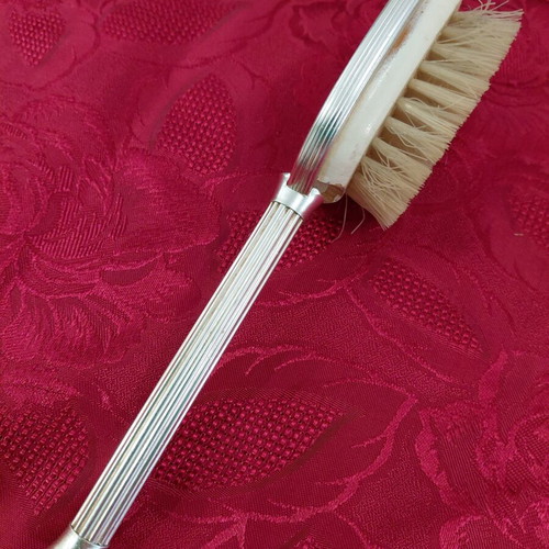 Vintage boudoir clothes brush from the 1970s, used
