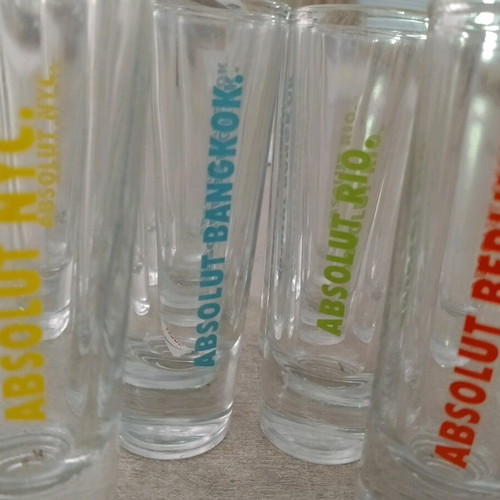 Collectible Absolut shot glasses with city names, like new