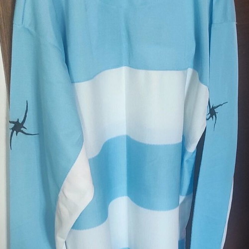 Zeus sportswear medium like new, white and turquoise