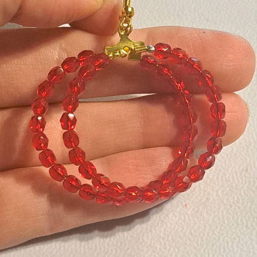 Earrings with red beads on silver hoop like new
