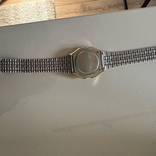 Casio digital watch used, gold color