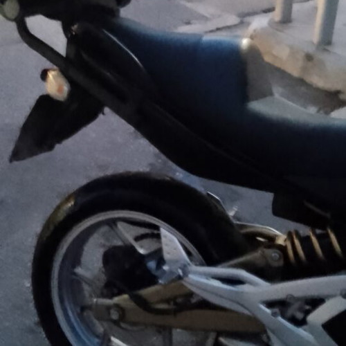 Kawasaki ER6 650cc motorcycle, 66000km, leather accessories